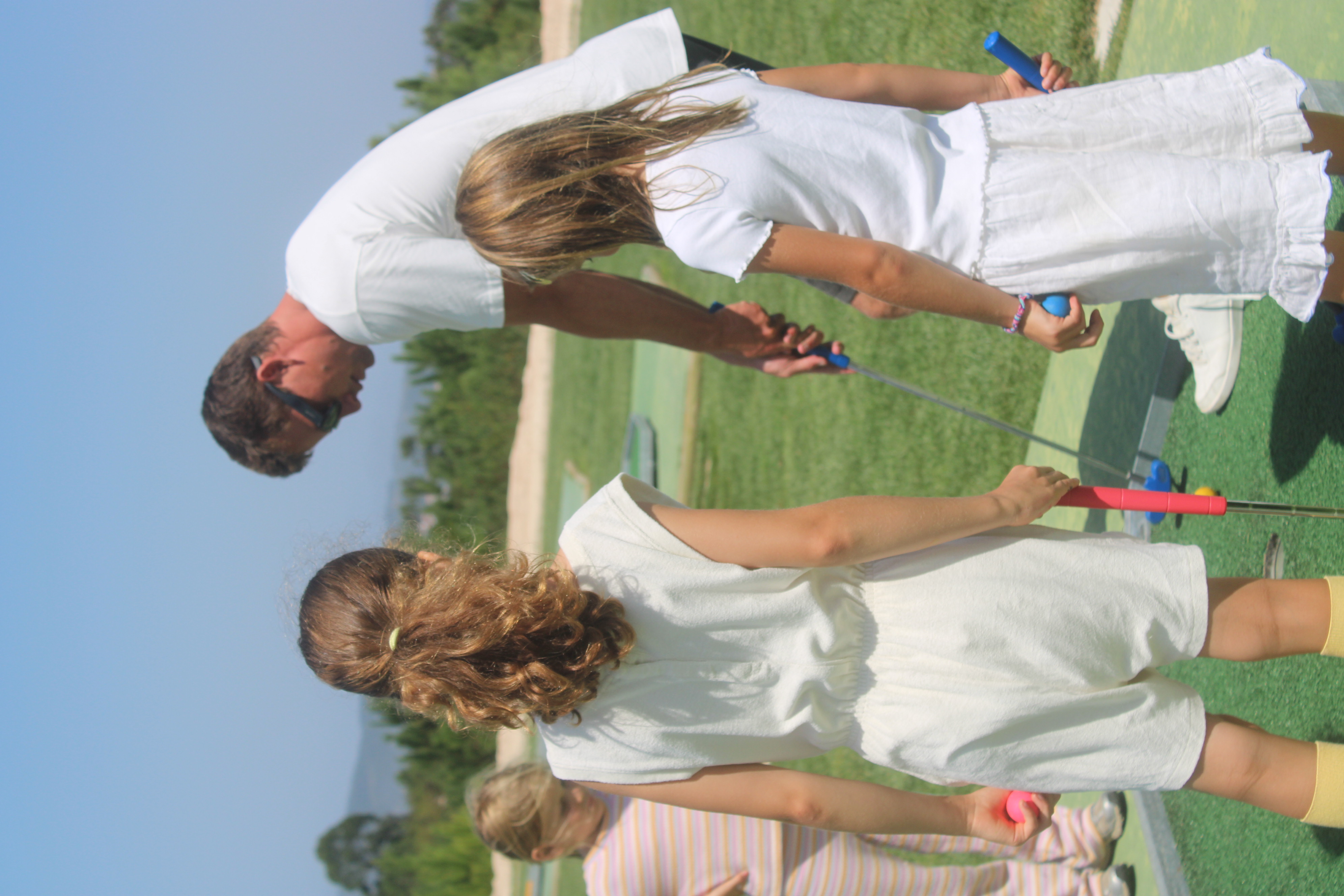 Kids doing outdoor activities on the grass